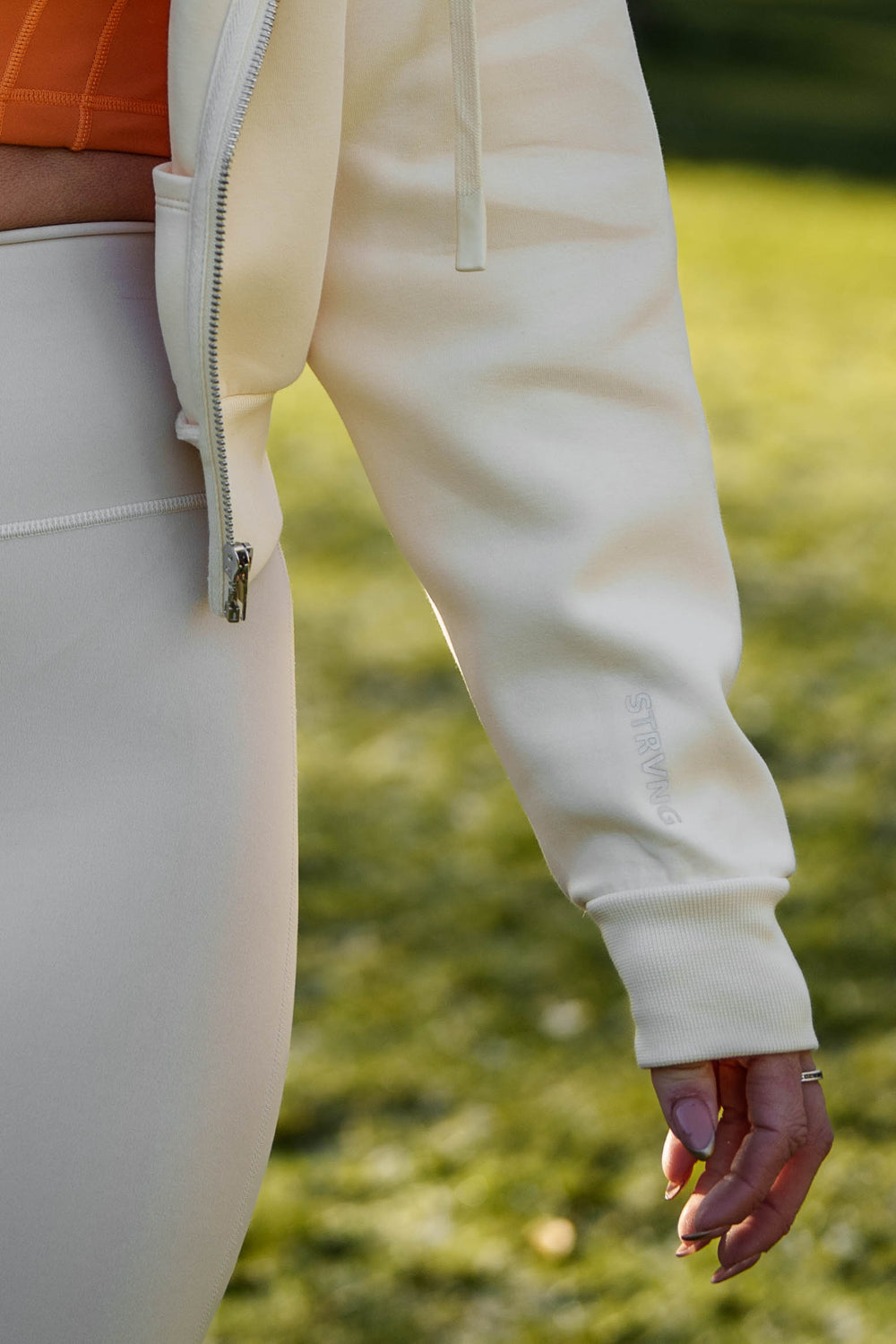 Cream Cropped Zip Hoodie ribbed cuff and zip detail