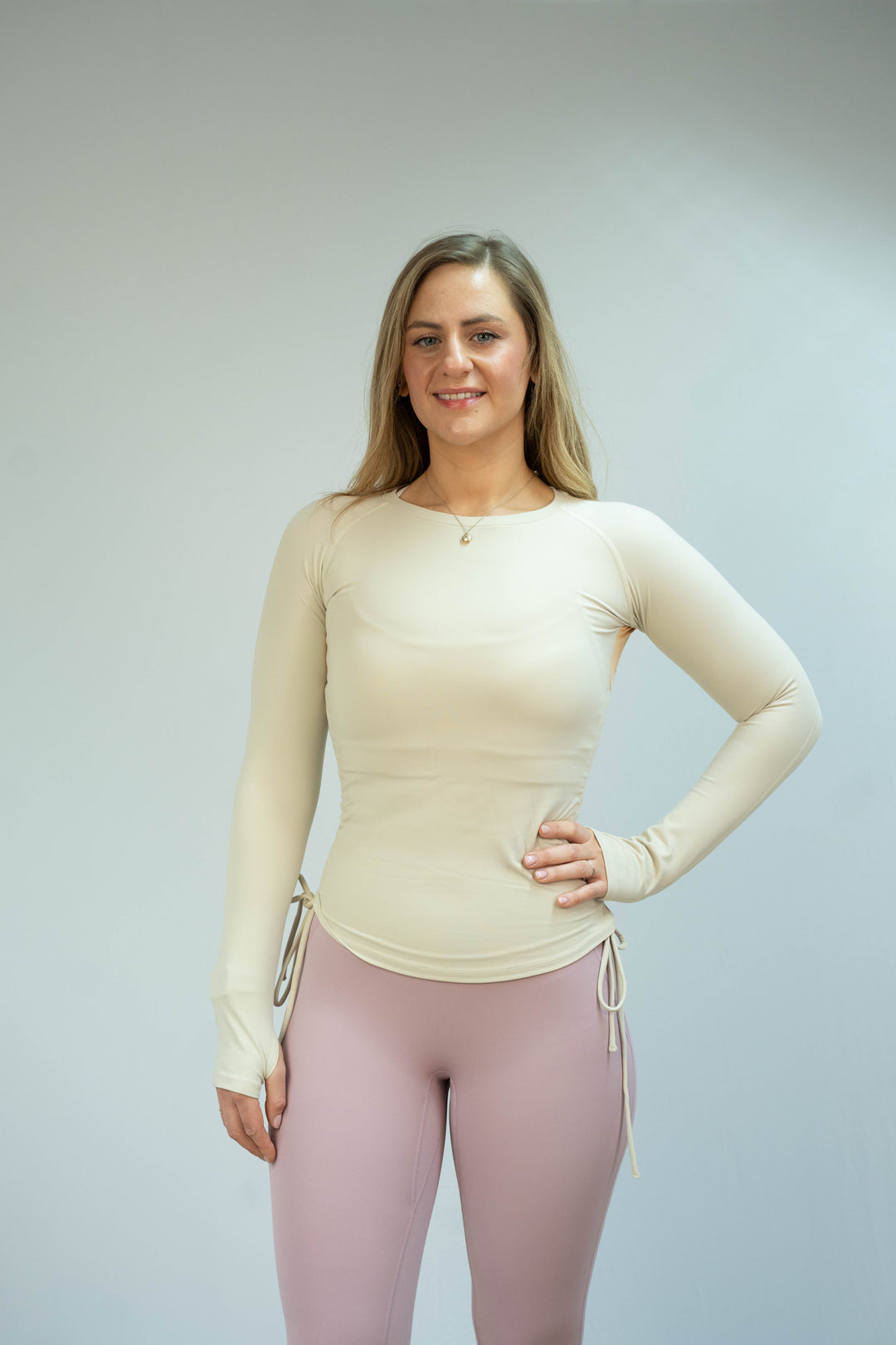 Beige Motion Ruched Top worn by Becky, full front view